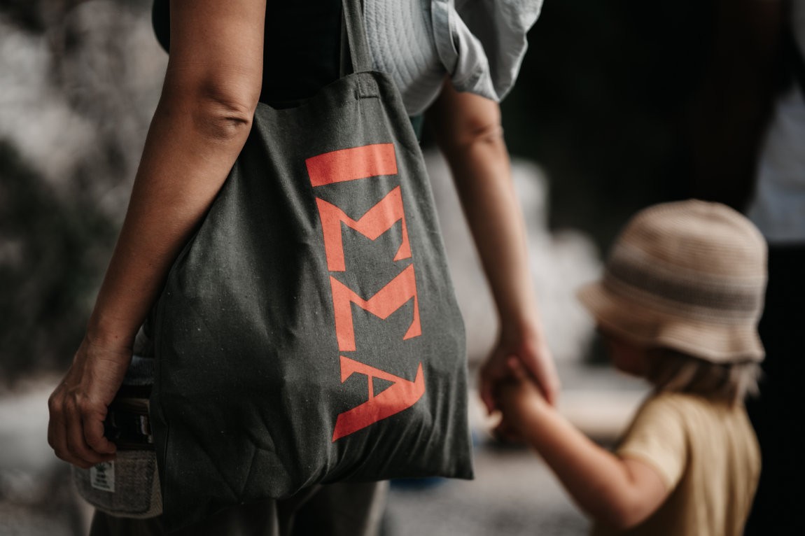 Person going to school with a child